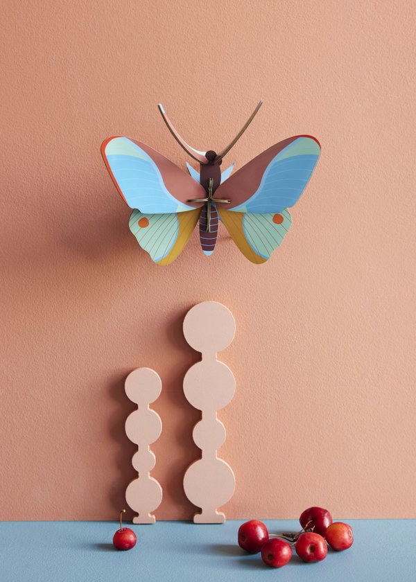 Wanddeko Papier 'Leuchtender Flügel'