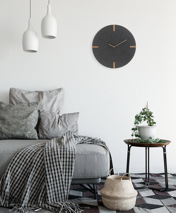 Zeitlose Wanddekoration und praktische Uhr in einem