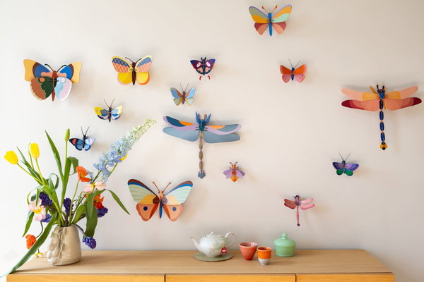 Wanddeko Papier 'Leuchtender Flügel'